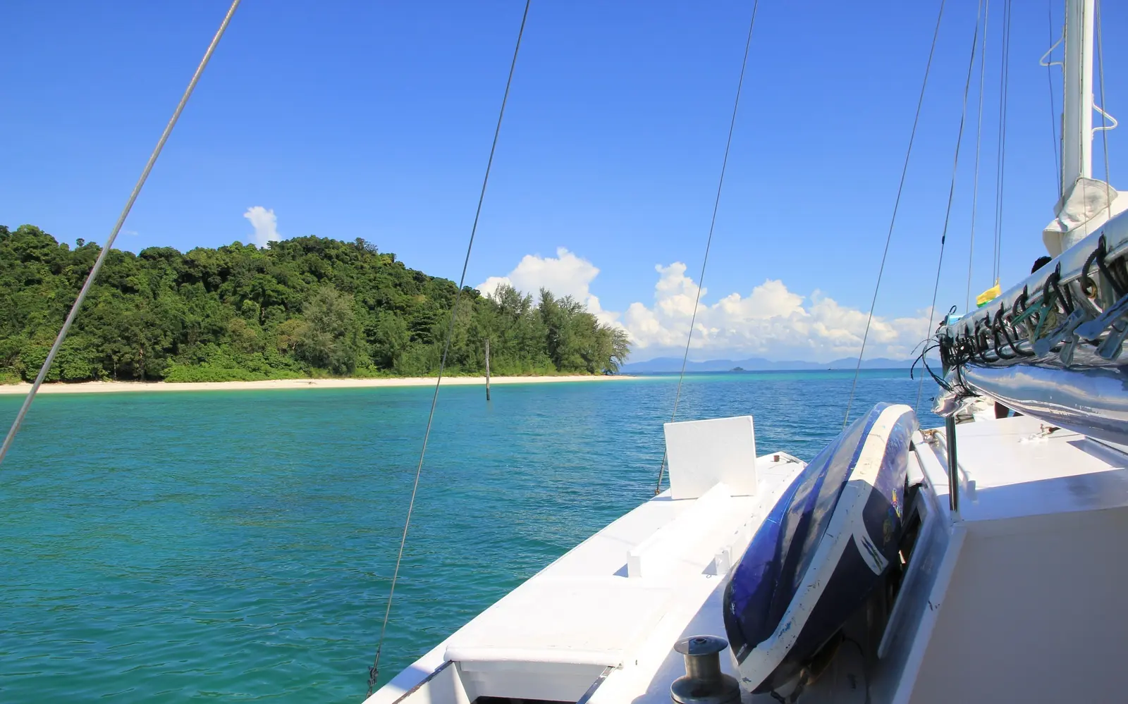 Empty island anchorage with forested hills and no development