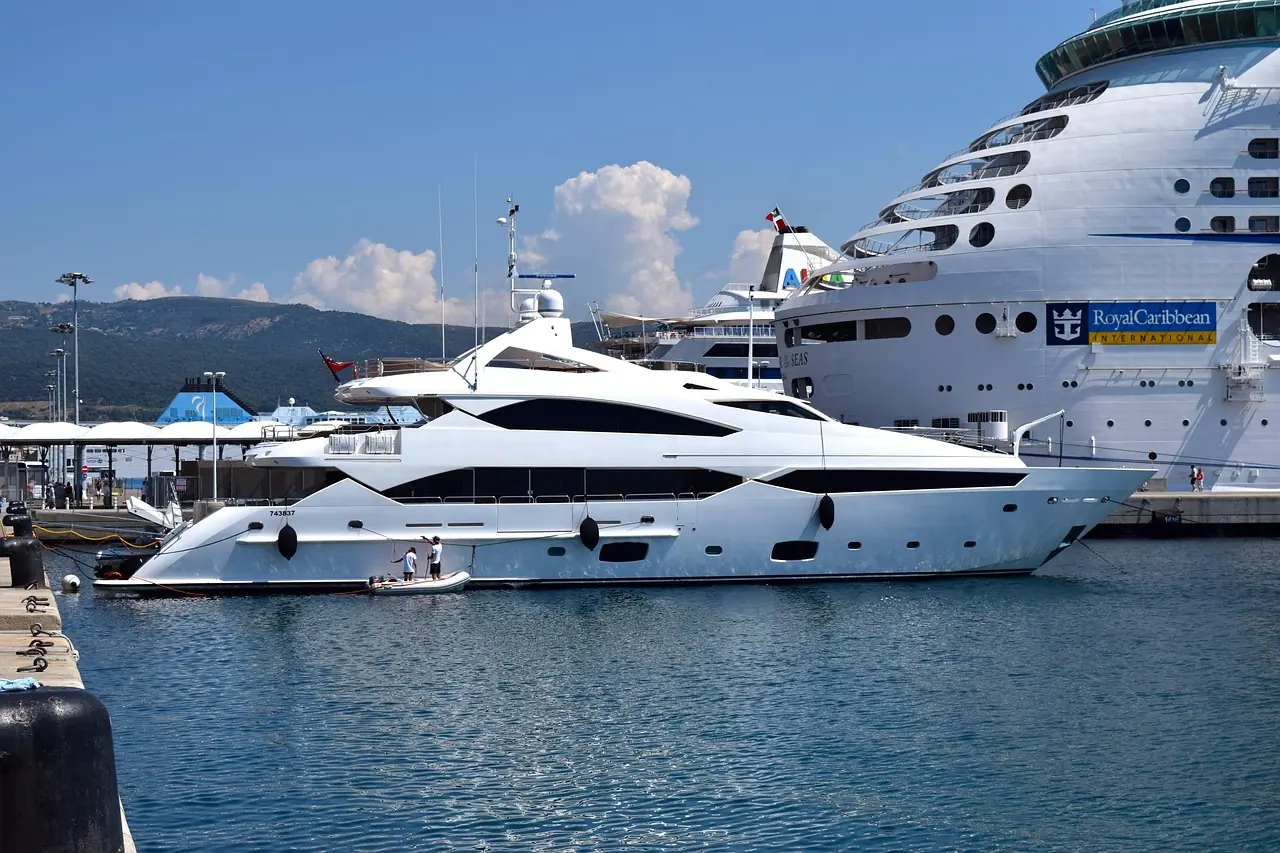 A large white superyacht under way in the Andaman Sea